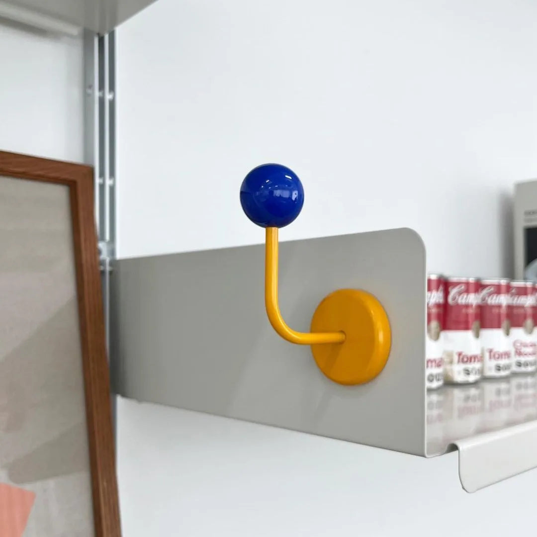Eprolo non-perforated magnetic hook for bathroom and kitchen, strong, seamless metal hook attached to a smooth surface.