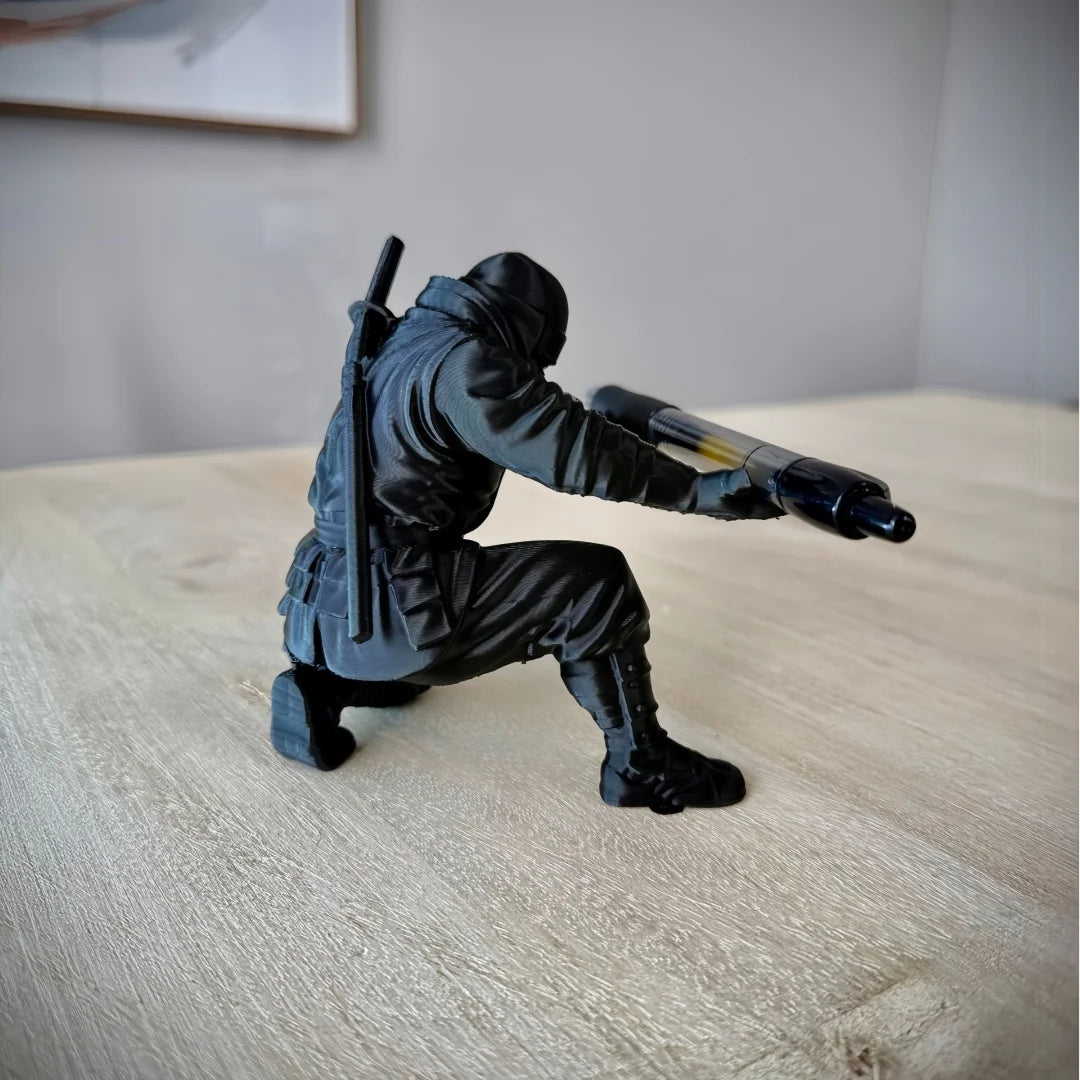 Black Warrior Pen Holder by eprolo, resin desktop organizer for pens and stationery, featuring a sleek, modern design.