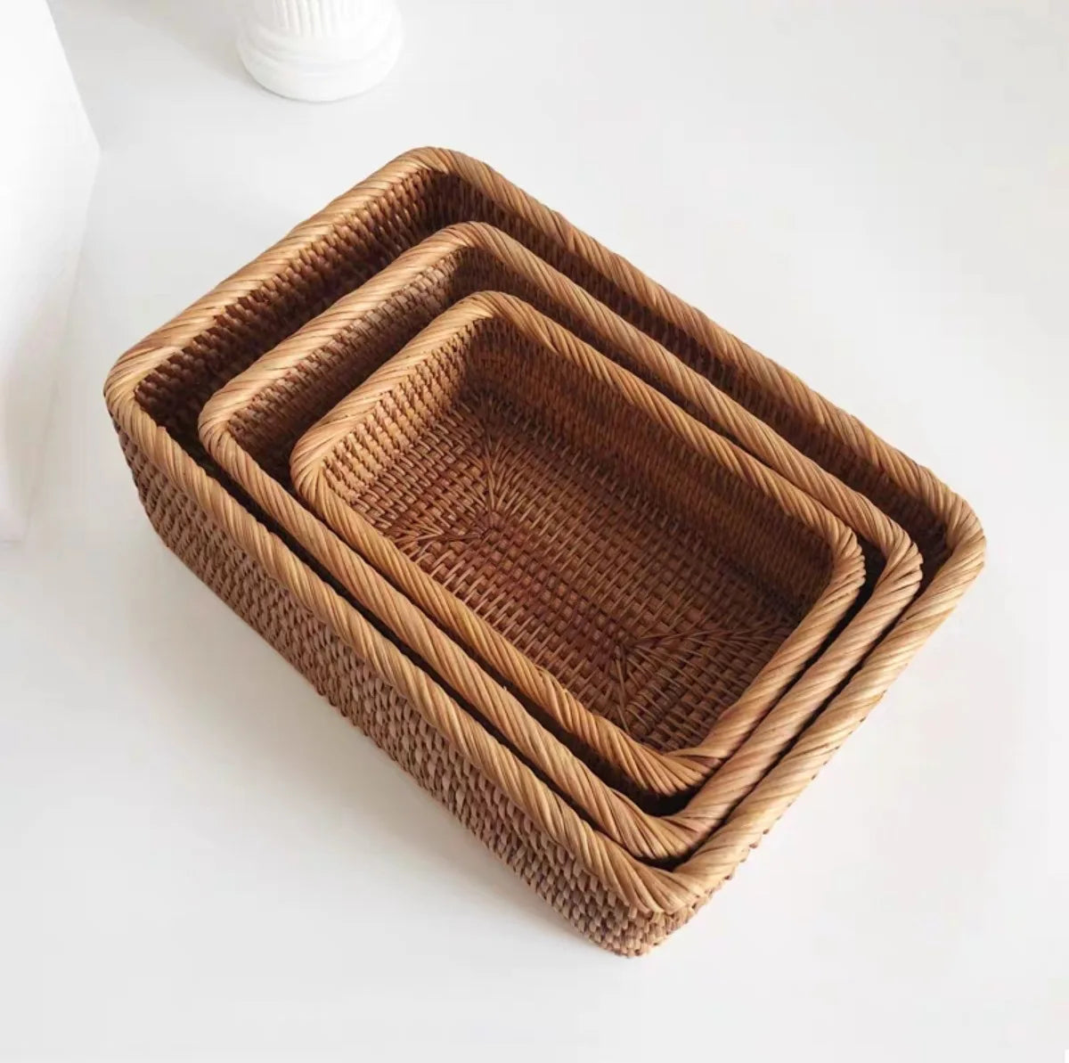 Hand-woven rattan wicker basket by eprolo, used for fruit, tea, snacks, or bread storage, showcasing its natural craftsmanship.