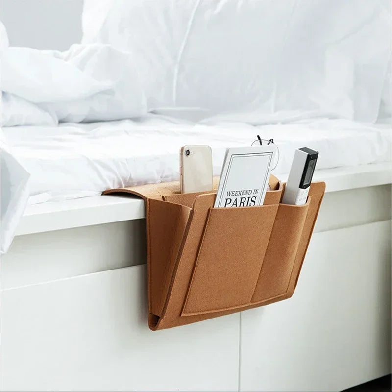 Eprolo felt bedside storage bag hanging organizer with pockets for sofa or bed, ideal for bedside or desk organization.