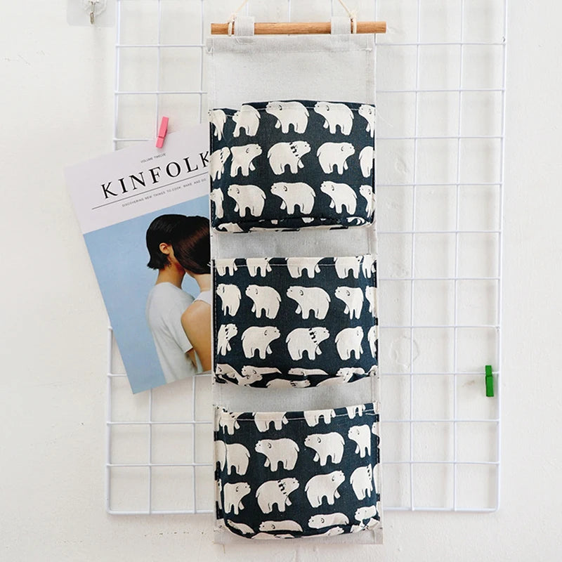 eprolo dormitory wall hanging storage bag with three pockets for organization and space-saving home storage.