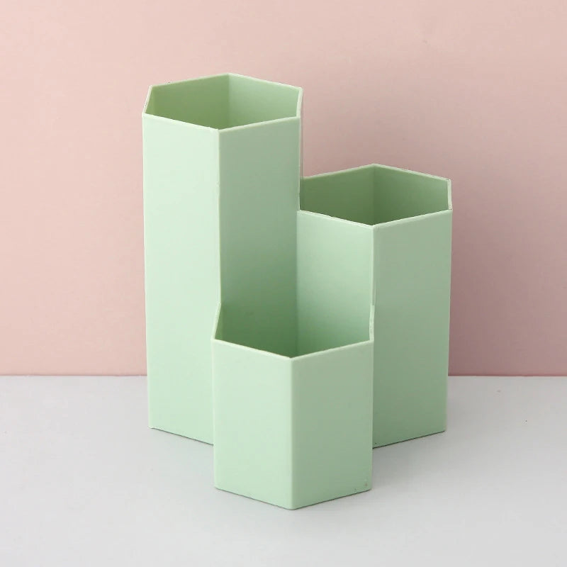 Eprolo multi-functional frosted honeycomb pen holder with large capacity for organizing pens and stationery on a desk.