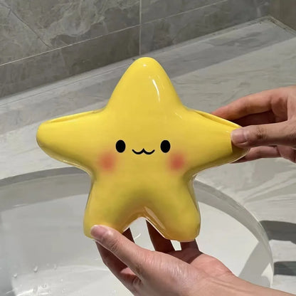 Cute star-shaped toothbrush holder by eprolo, freestanding bathroom organizer with multiple compartments for toothbrushes and accessories.