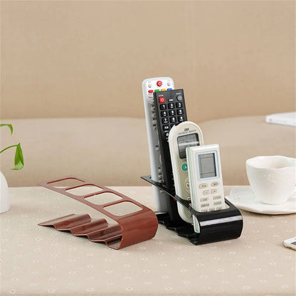 Eprolo 4-section TV remote control stand holder for organizing home appliance remotes on a flat surface.