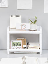 Eprolo minimalist desktop double-layer storage rack for organizing stationery and household items on a clean workspace.