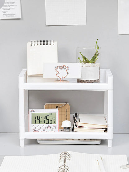 Eprolo minimalist desktop double-layer storage rack for organizing stationery and household items on a clean workspace.