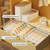 Eprolo fabric drawer organizers for underwear, socks, and bras, showing neatly folded items in a tidy closet storage solution.