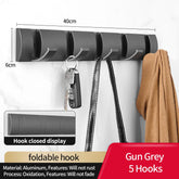 Eprolo folding door hooks towel hanger nail-free wall rack with hooks for hanging towels or clothes, mounted on a wall.