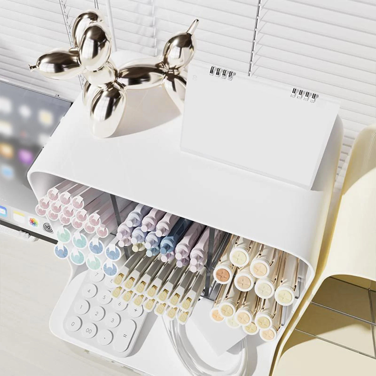 eprolo students’ large-capacity oblique pen holder desk stationery storage box on a workspace with pens and stationery.