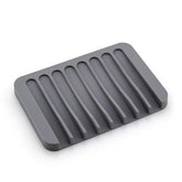 Eprolo free punch soap box silicone soap holder with drainage holes, black color, designed for countertop kitchen or bathroom use