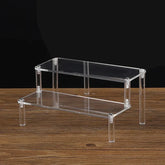 Clear acrylic display stand with 1-5 tiers for cupcakes, ideal for showcasing desserts or small items.