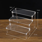 Black acrylic display stand with 1-5 tiers, clear riser rack for cupcakes, ideal for showcasing desserts and treats.