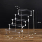 Black acrylic display stand with 1-5 tiers, clear riser rack for cupcakes, perfect for showcasing baked goods or desserts.
