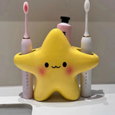 Cute star-shaped toothbrush holder by eprolo, freestanding bathroom organizer with space for toothbrushes and small toiletries.