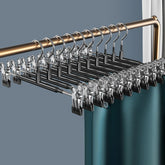Eprolo wardrobe clothes drying rack with skirt clip, seamless stainless steel design for home laundry and garment drying.