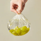 Set of 100 disposable food-grade cling film covers by eprolo, ideal for protecting food in home kitchens.
