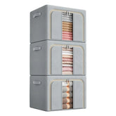Steel frame household closet storage basket set with three large capacity bins for organizing clothes and accessories.