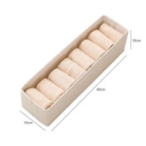 Eprolo wardrobe storage organizer with drawers holding T-shirts, jeans, underwear, and pants in a closet.