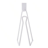 eprolo stainless steel wall-mounted toilet paper holder with no-drill, space-saving design, mounted on bathroom wall.