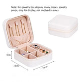 Small zipper storage box by eprolo for organizing rings and earrings, featuring multiple compartments for jewelry storage.