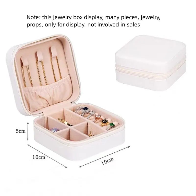 Small zipper storage box by eprolo for organizing rings and earrings, featuring multiple compartments for jewelry storage.