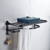 Matte black 50cm folding towel holder with hook, wall mount, made by eprolo, mounted on a bathroom wall.