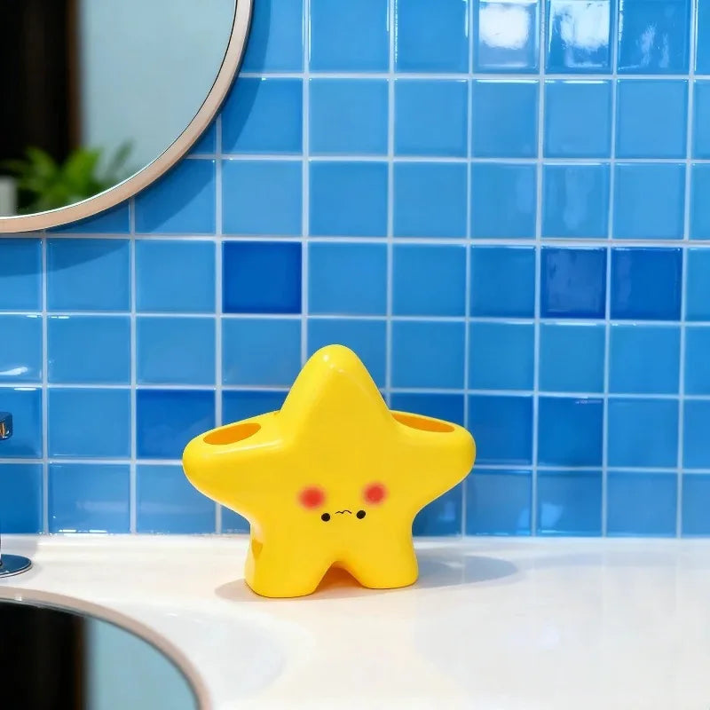 Cute star-shaped toothbrush holder by eprolo, freestanding bathroom organizer with multiple slots for toothbrushes and toothpaste.