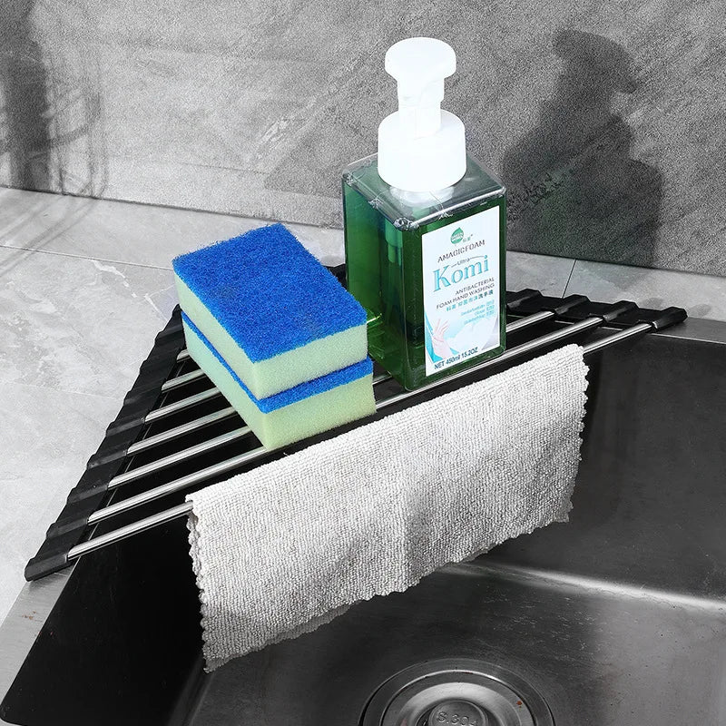 Foldable stainless steel triangle dish rack by eprolo with corner sink storage and sponge organizer for drying dishes and utensils.