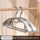 Eprolo upgraded thickened wide shoulder non-slip seamless clothes hanger hanging shirts and jackets in a closet.