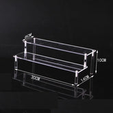 Clear acrylic cupcake display stand with 1 to 5 tiers, ideal for showcasing desserts and treats in a professional setting.