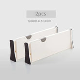 eprolo 4-pack adjustable drawer dividers organizer showing retractable, customizable storage compartments in a kitchen drawer