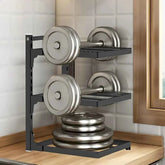 Black 3-tier dumbbell rack with chrome weights, ideal for home gym organization and space-saving storage