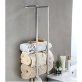 Wall-mounted bathroom towel rack by eprolo with horizontal bars for rolled towels, ideal for bathroom towel storage.