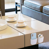 Two eprolo wall-mounted storage boxes with mobile phone holder and plug rack, ideal for organizing gadgets and accessories.