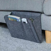 Eprolo felt bedside storage bag hanging organizer with multiple compartments for sofa or bedside use.
