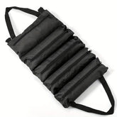 Heavy-duty eprolo roll-up tool bag made of Oxford fabric with multiple tool compartments and secure closure.
