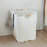Waterproof cotton linen laundry basket by eprolo with handles, designed for dirty clothes and fabric organization.