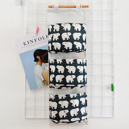 eprolo dormitory wall hanging storage bag with three pockets for organization and space-saving home storage.