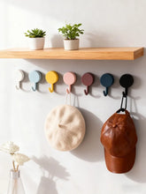 Set of 10 colorful eprolo mini adhesive hooks for versatile hanging solutions on walls and surfaces