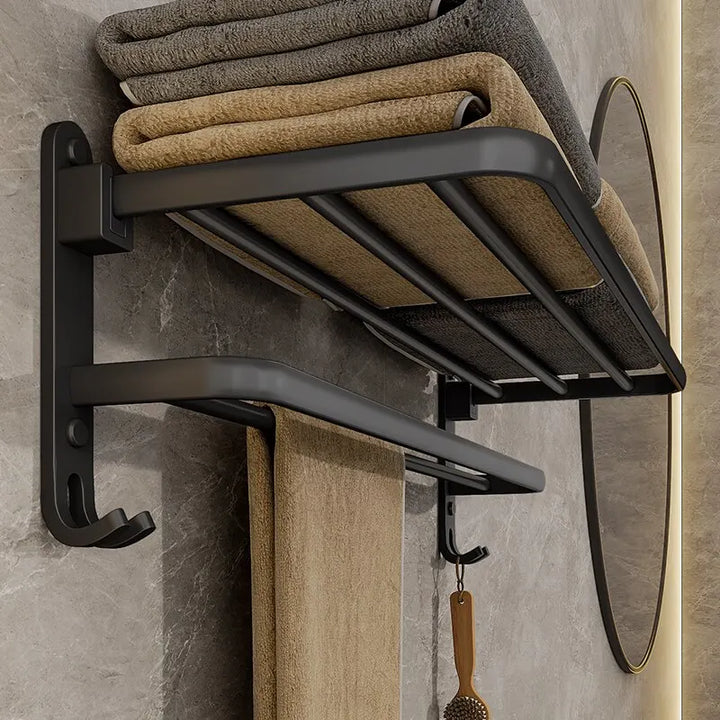 Matte black 50cm folding towel holder with hook, wall mount by eprolo, showing its sleek, space-saving design and wall mounting hardware.