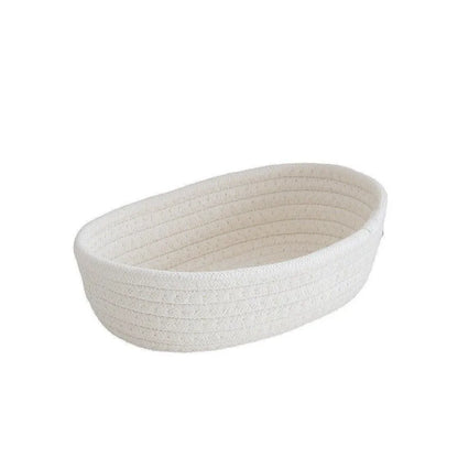 Eprolo Nordic cotton rope woven storage basket for organizing home items, with a sturdy handle and natural beige color.