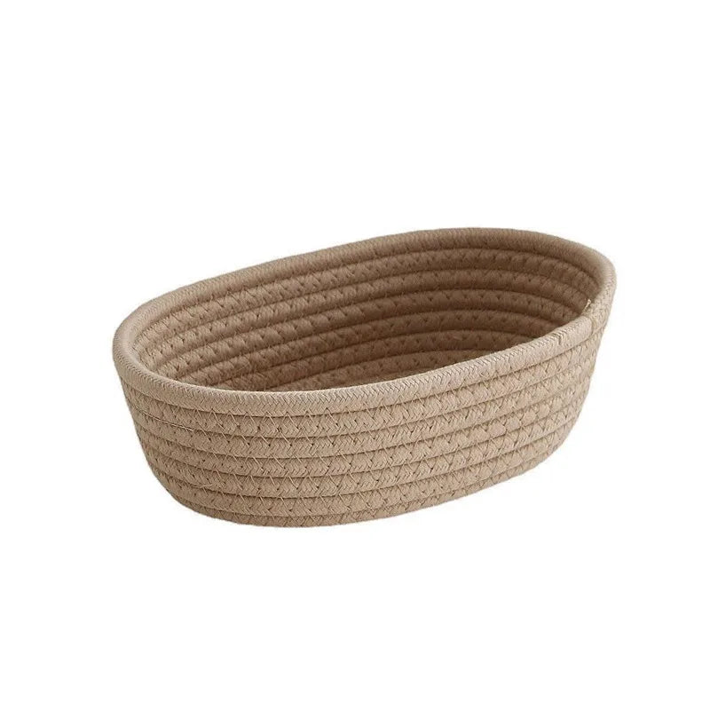 Eprolo Nordic cotton rope woven storage basket with handles, round shape, used for organizing household items or toys