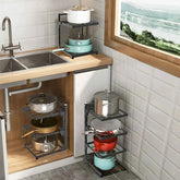Kitchen pot rack organizer with tiered shelves storing cookware under sink and in corner, maximizing space