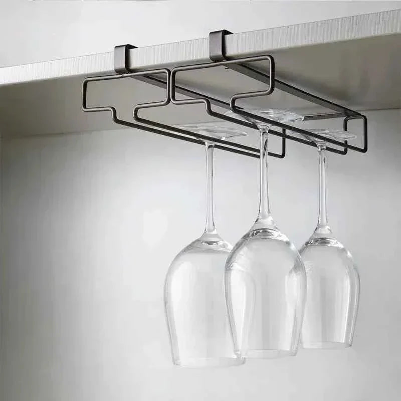 Under-cabinet wine glass holder with three hanging stems, sleek metal design for kitchen storage