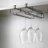 Under-cabinet wine glass holder with three hanging stems, sleek metal design for kitchen storage