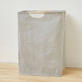 Eprolo waterproof laundry basket made of cotton linen fabric, designed for organizing dirty clothes and laundry in a modern home.