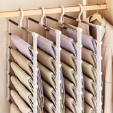 eprolo foldable pants hanger with multi-layer design and non-slip clips, space-saving closet organizer for trousers and skirts
